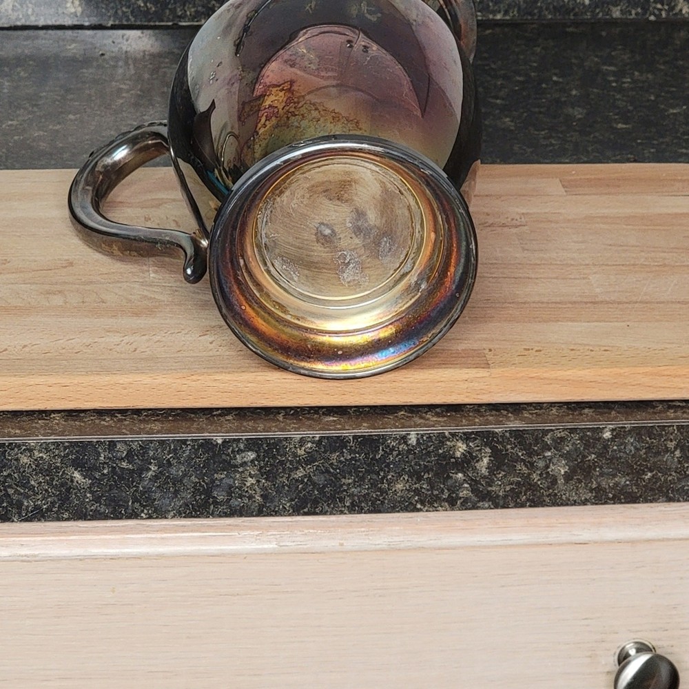 Silver antiqued distressed pitcher