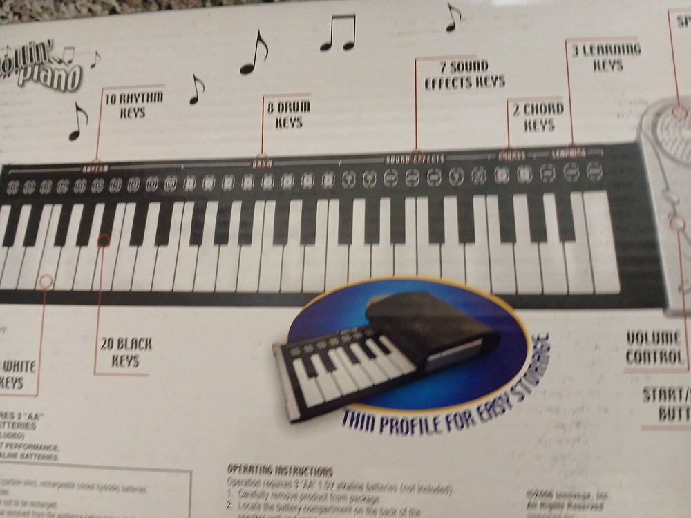 Rollin' Piano 49 KeysTouch Sensitive Mat-30 Function Buttons Boxed Age 7 & UP!