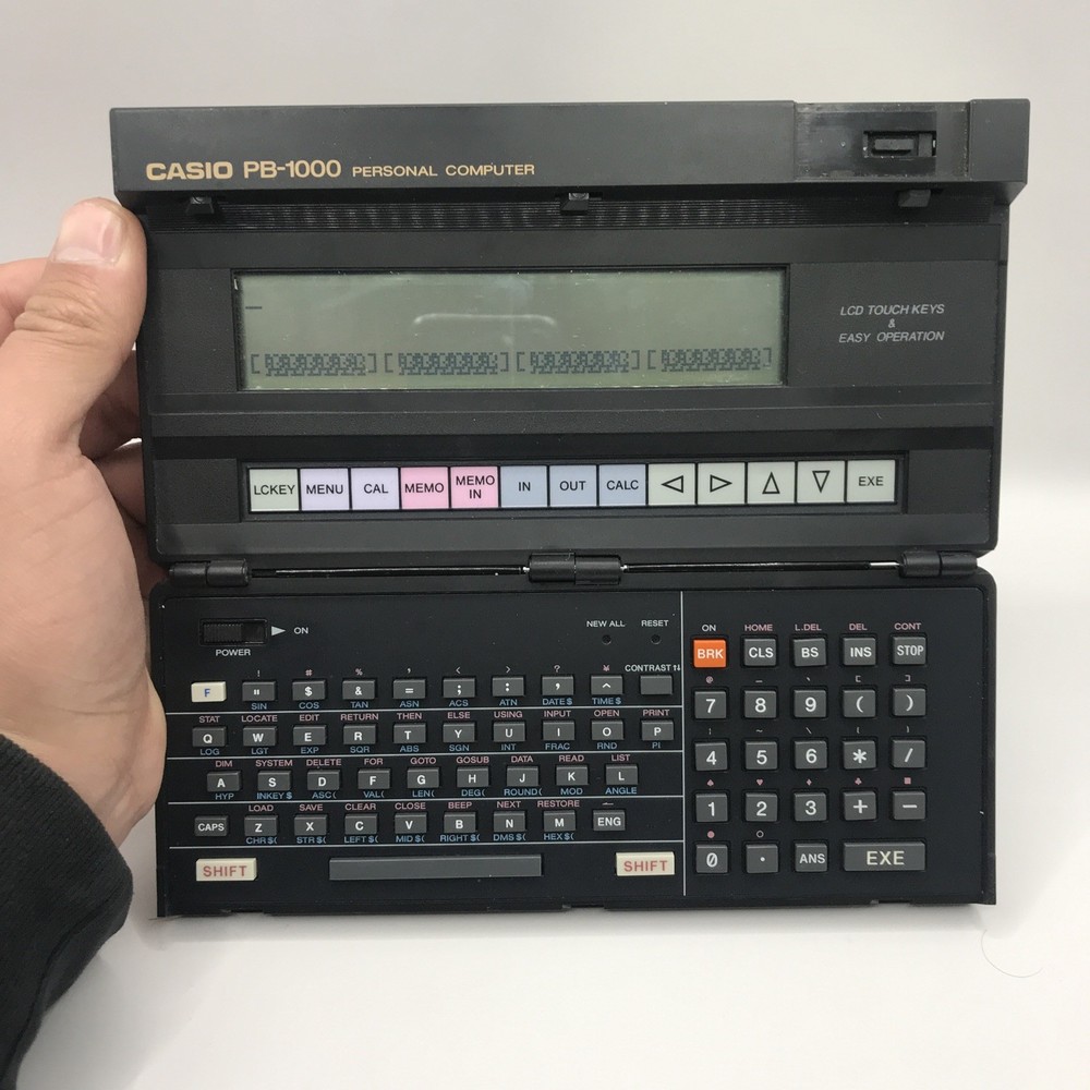CASIO PB-1000 POCKET PERSONAL COMPUTER TURNS ON (NEEDS REPAIR)