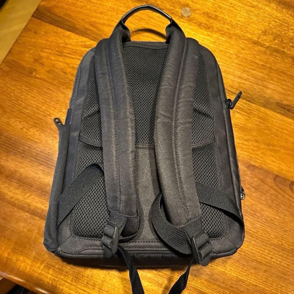 TUMI geometric pattern black backpack