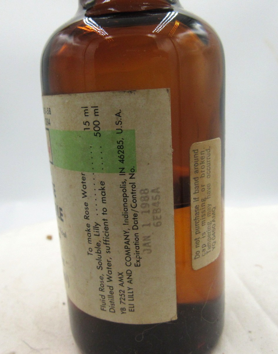 MM - 1980's Eli Lilly Rose Soluble Indianapolis Ind 4 7/8" Amber Medicine bottle