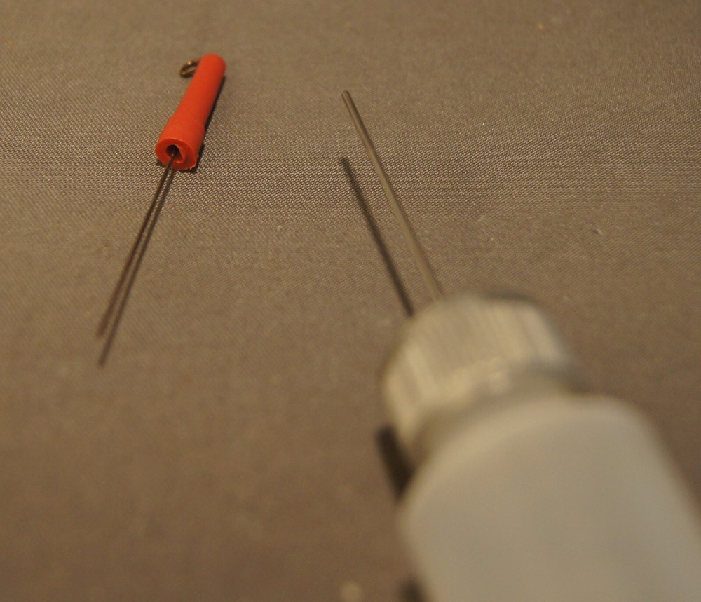 THREE PLASTIC SQUEEZE BOTTLES