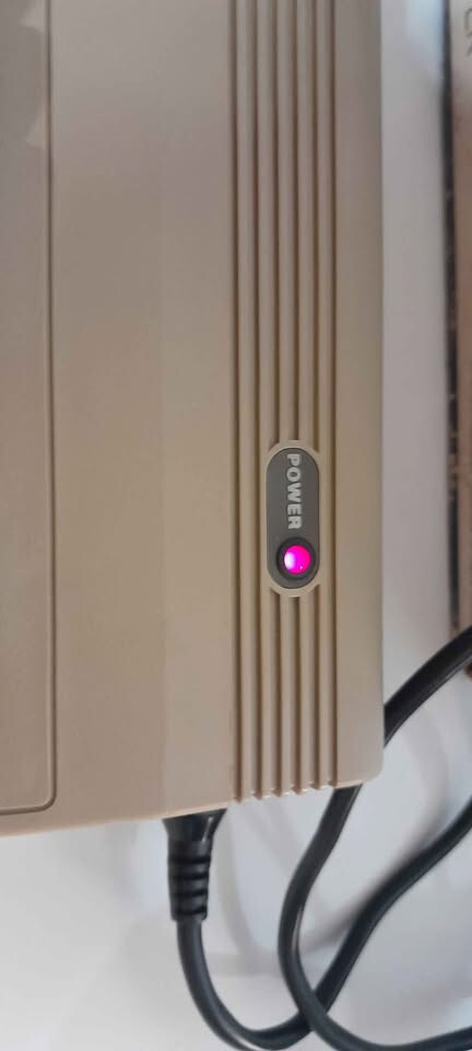 Vintage Commodore 64 computer in box, manuals and programs package