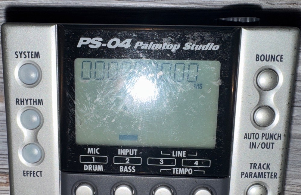 ZOOM PS-04 Palmtop Studio Portable Multi-Track Recorder With Memory Chip.