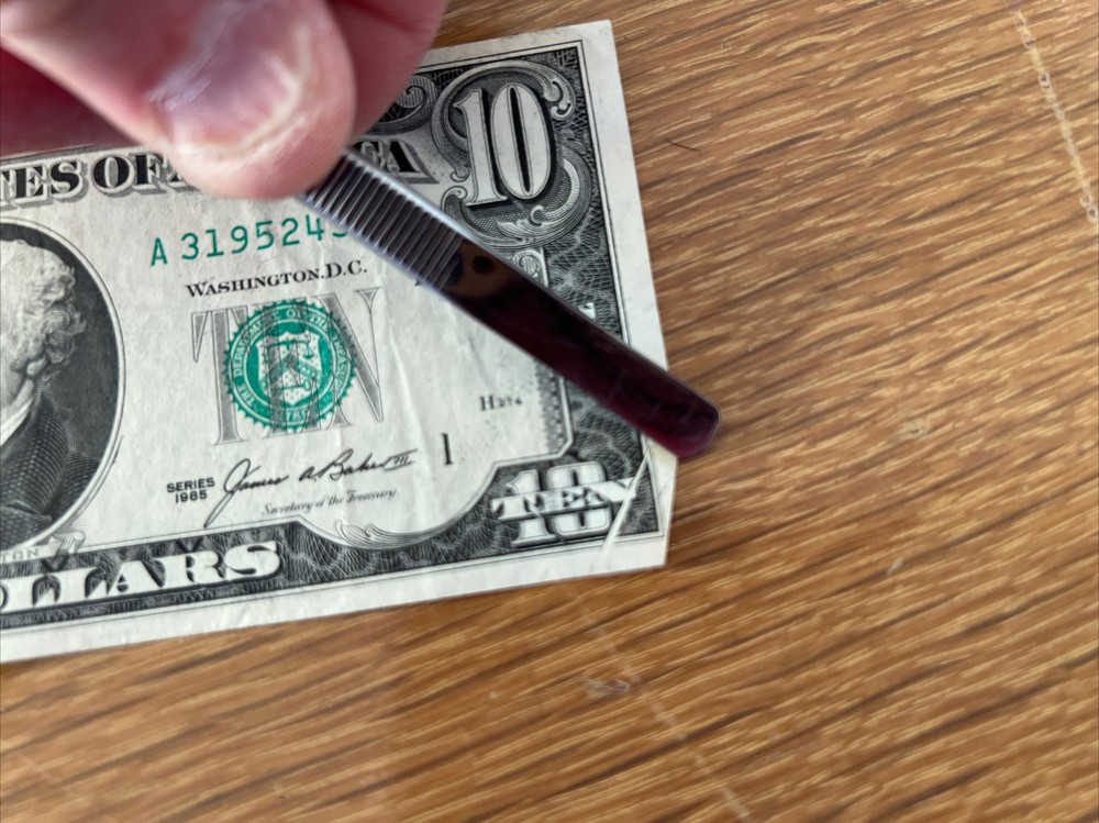 misprint and cut dollar bill