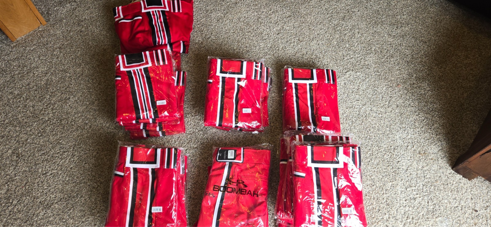 70 pairs Men's softball pants, White, Red, Black. Most new.