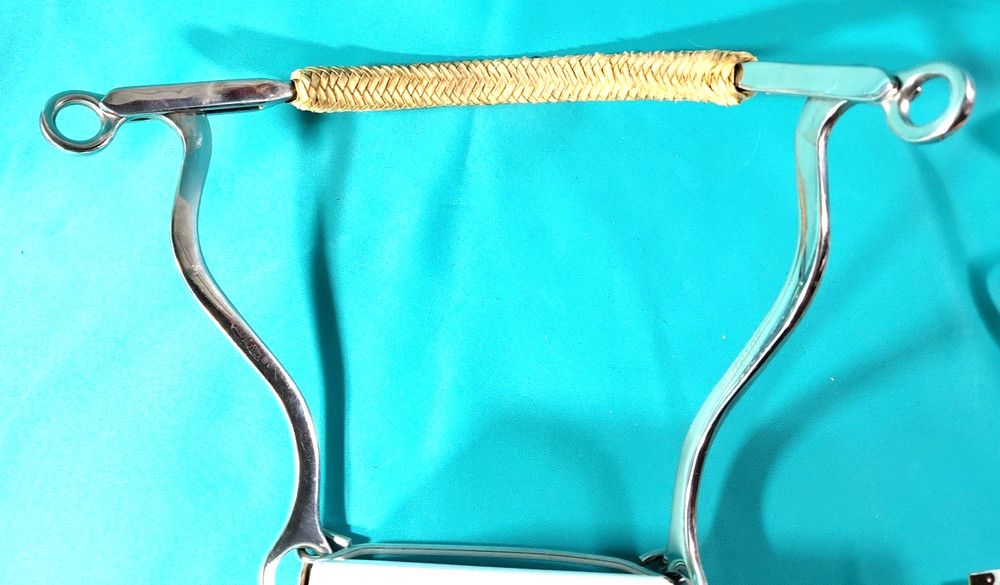 HORSE MECHANICAL HACKAMORE STAINLESS BRAIDED RAWHIDE PARTRADE