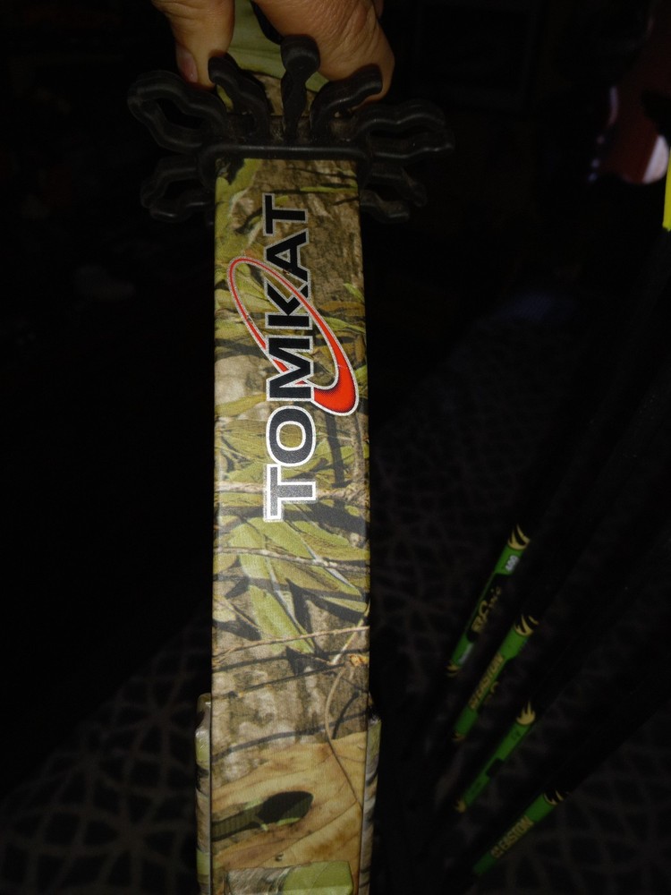 tomkat bowtech compound bow with aftermarket scope
