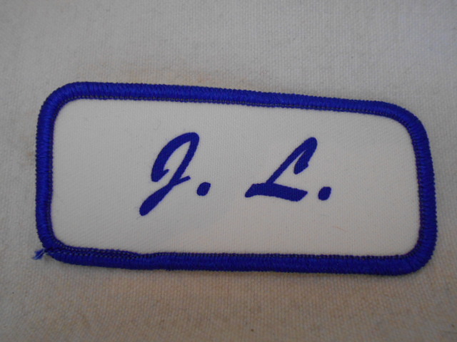 J.L.  USED SILK SCREEN NAME PATCH TAG  BLUE ON WHITE