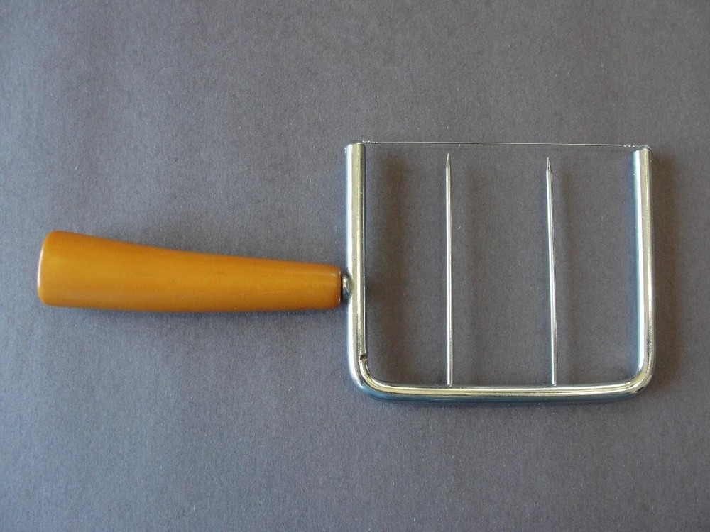 Butterscotch Bakelite Handled Cheese Slicer