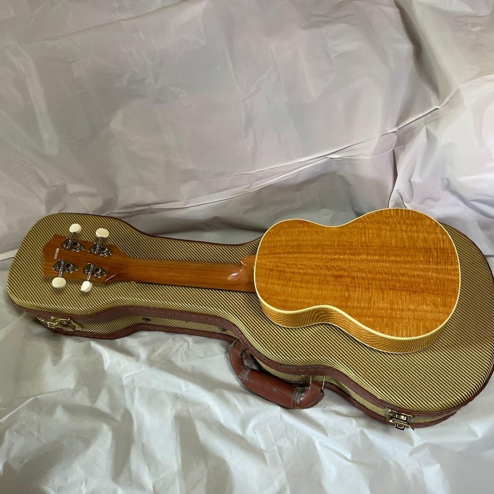 Soprano size ukulele and hard case