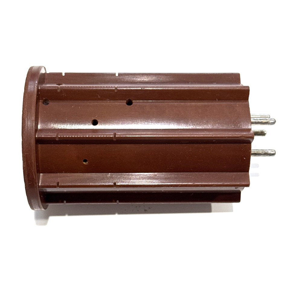 one 5 pin  plug-in coil form  OD= 57 mm L= 90 mm made by BUD  used DARK BROWN #1