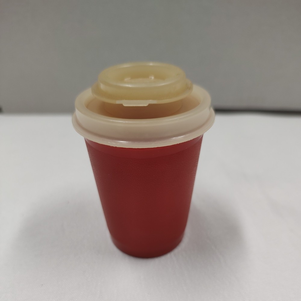 Tupperware red pepper shaker