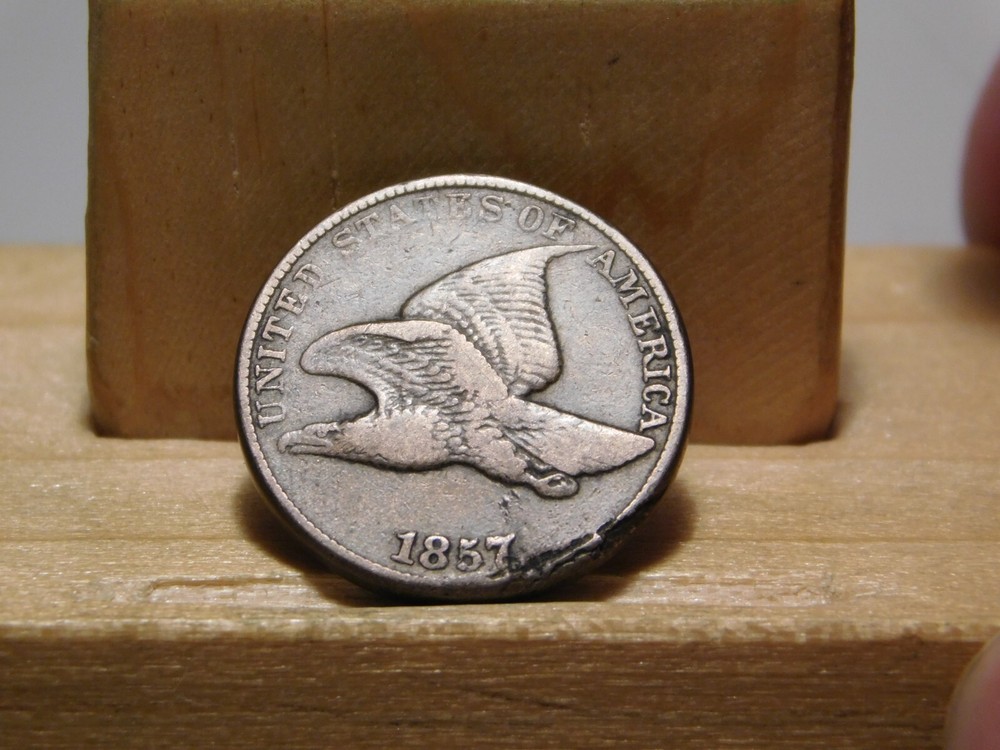 1857 U.S. Flying Eagle cent, lamination error at edge