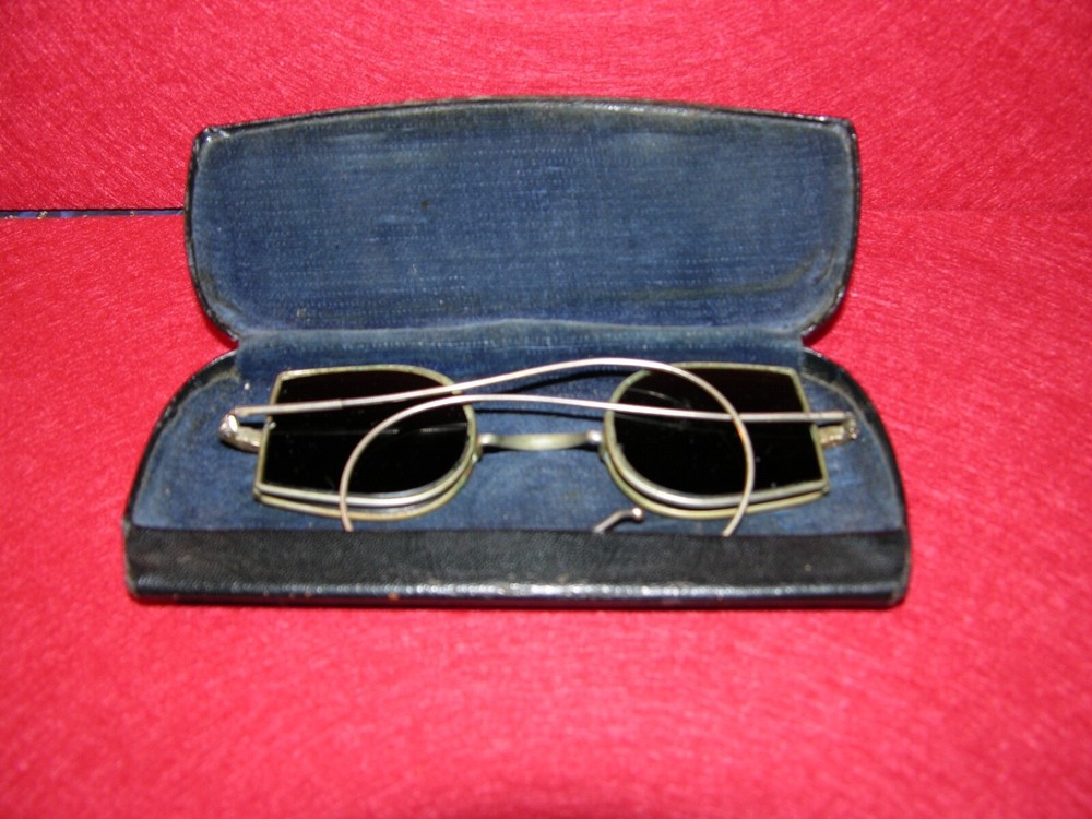 Antique welding glasses with case