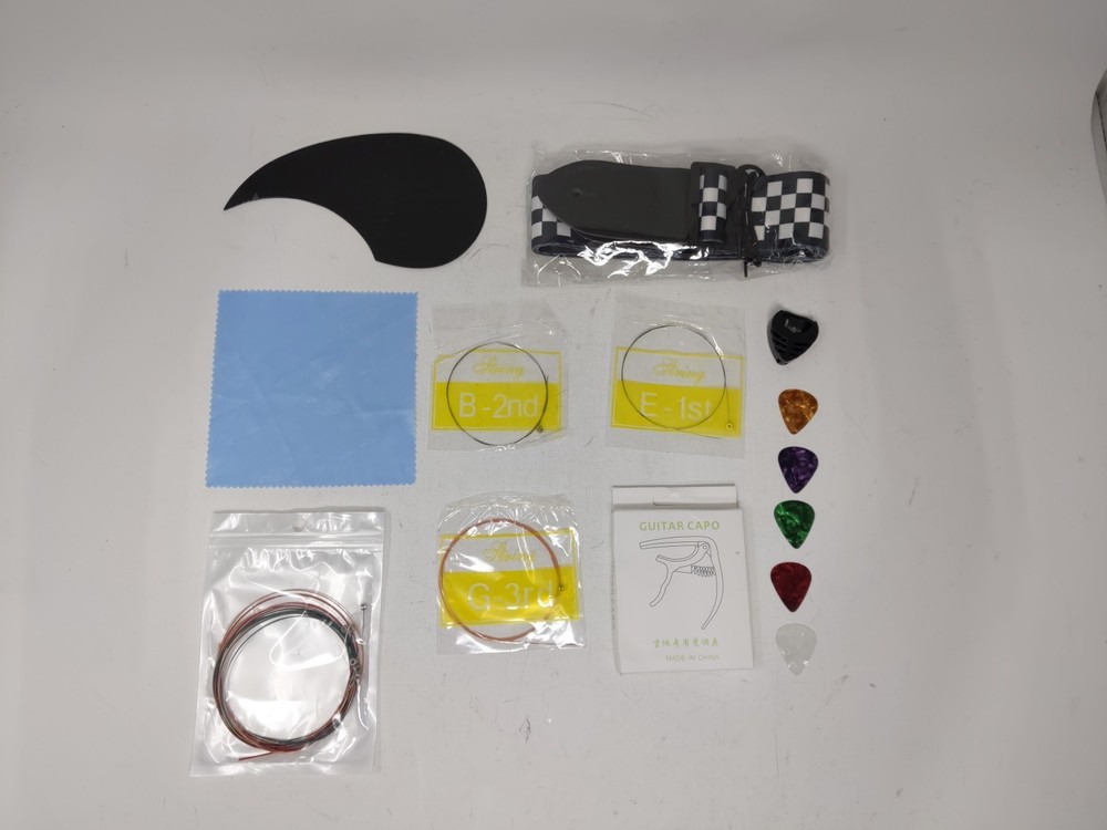 18pc Guitar Kit Capo + Strings + Picks + Pick Box + Guitar Checker Strap