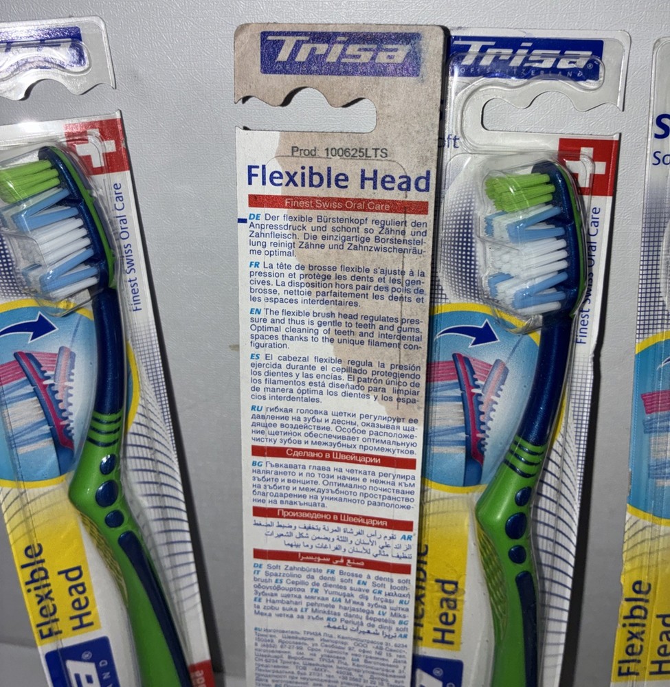 23 Trisa Flexible Head Toothbrushes/ All New