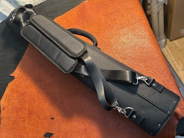 TNT 4x8 Black Nylon Pool Cue Case. Blue interior. Back Pack Straps.