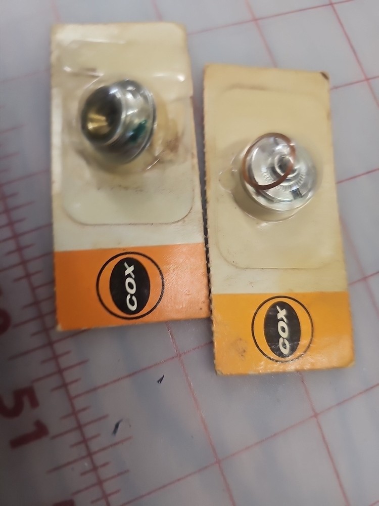 1 New 1 Slightly Used Glow Plug 1702