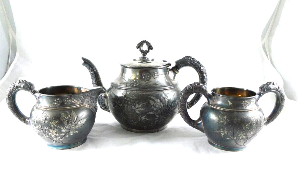 Antique Meriden Silver Plated Ornate  Tea Pot Creamer and Sugar circa 1869-1898