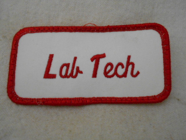 LAB TECH  USED EMBROIDERED  SEW ON NAME PATCH RED ON WHITE