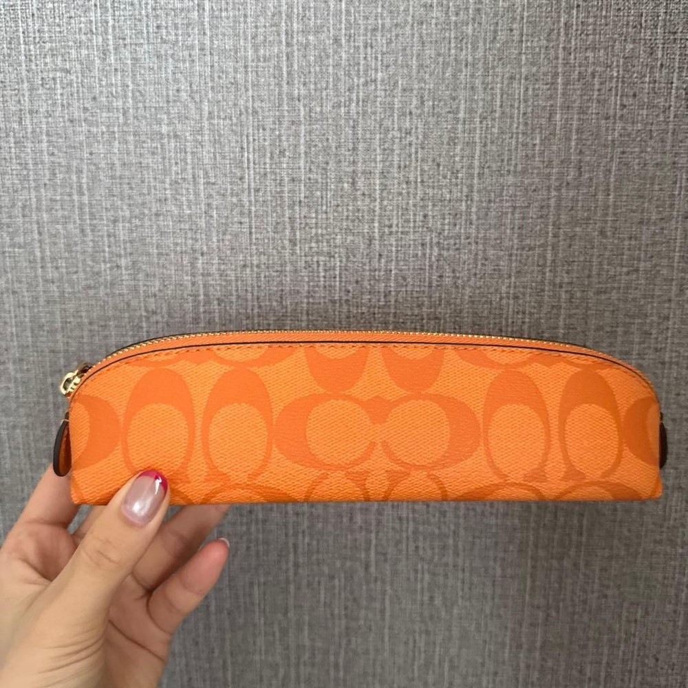 coach orange pencil case