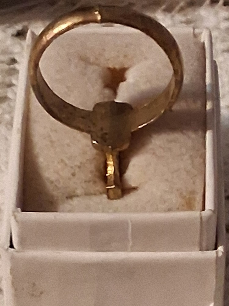 Early 40's to late 50's gold gun ring. Military based