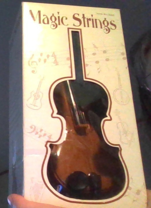 Magic Strings VIOLIN gently used (plays 8 tunes)