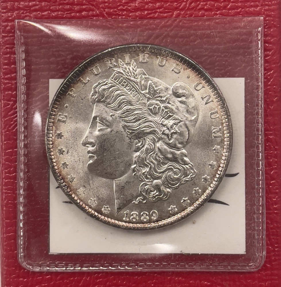 1889 P Morgan Silver Dollar, Gem Uncirculated.