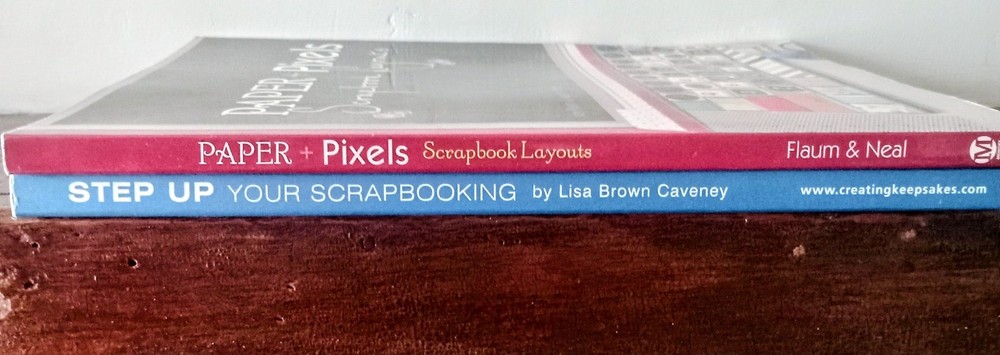 two scrapbooking instructional/layout books. one has program CD included.