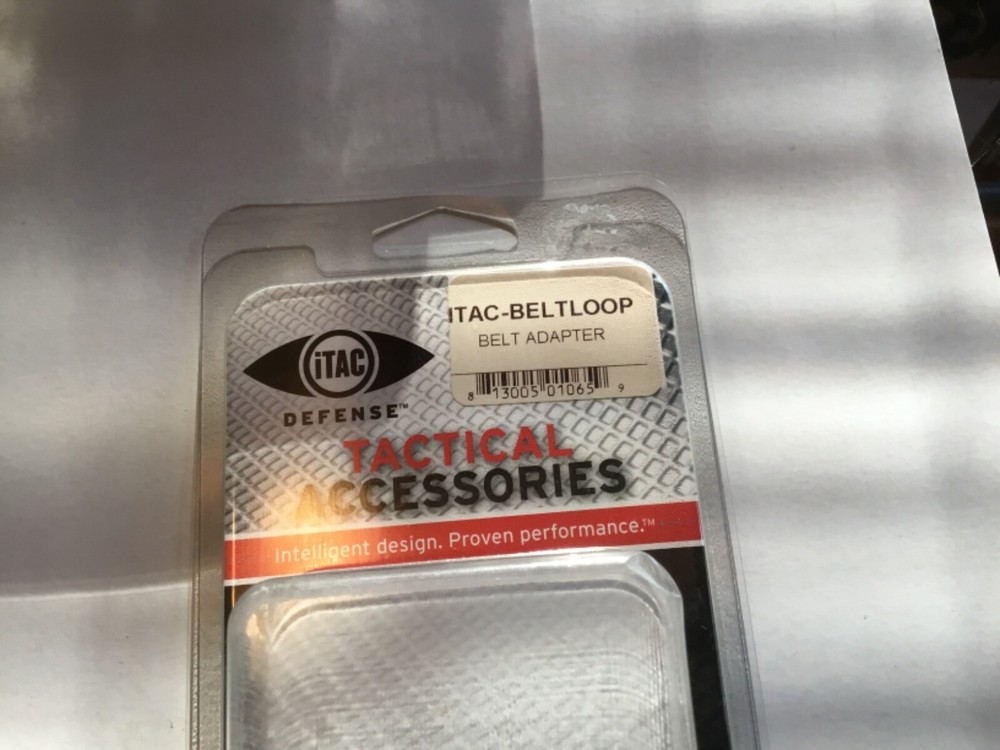 ITac   paddle holster belt loop adapter.