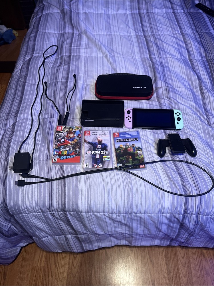 Nintendo Switch, Comes With Everything And Games.