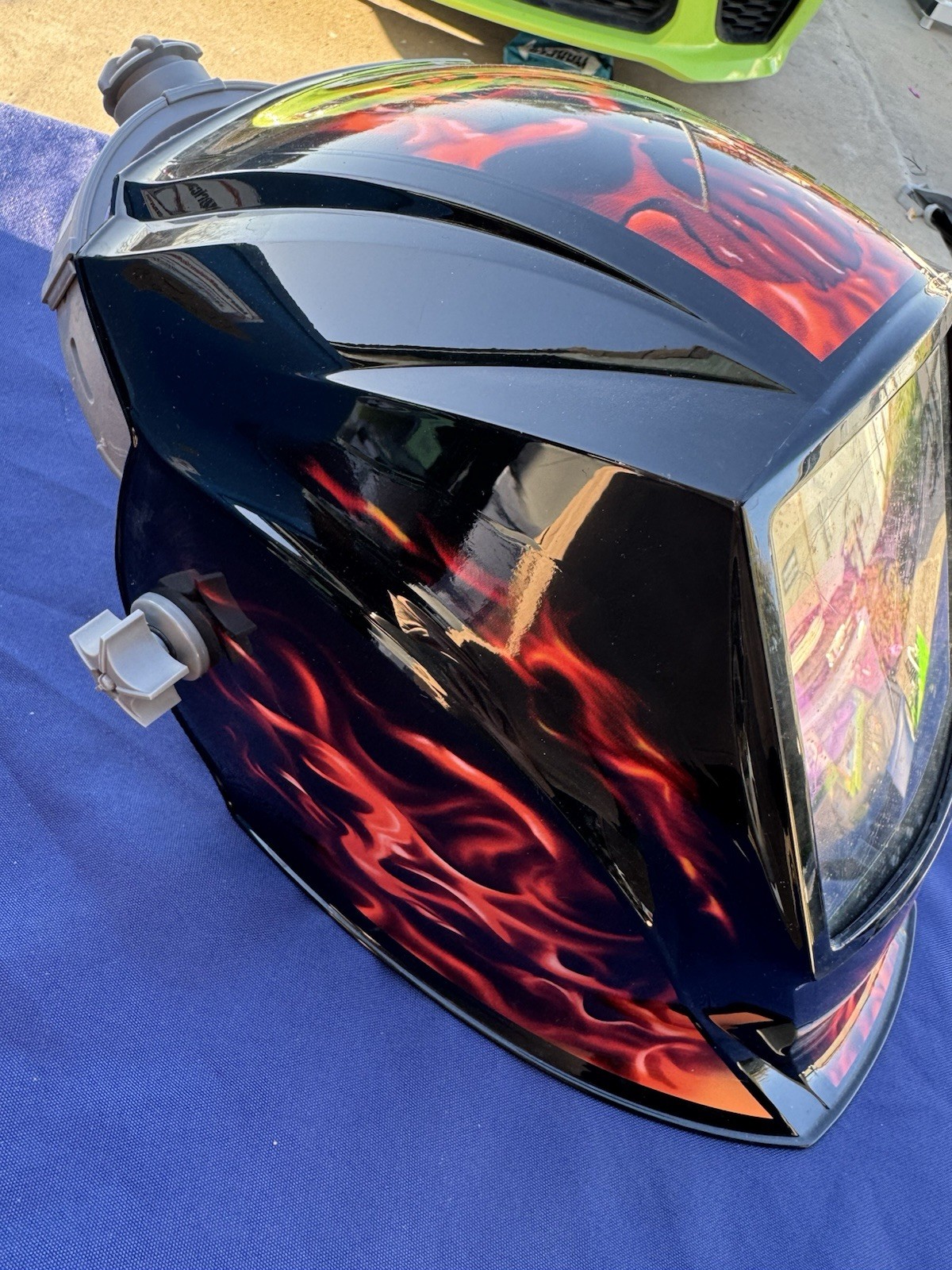 Miller Elite Welding Helmet with manual and extra lenses, new batteries