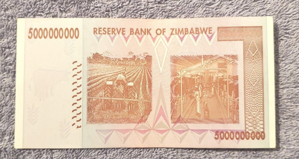 IT. # G-180 / One Zimbabwe $5 BILLION NOTE CIRCULATED CONDITION