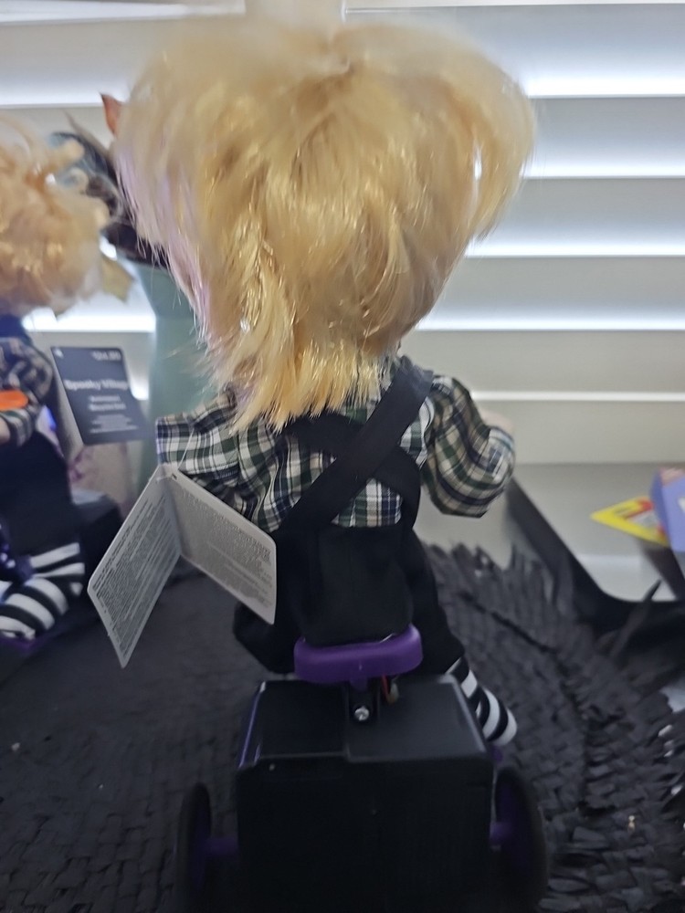 Animated Bicycle Doll