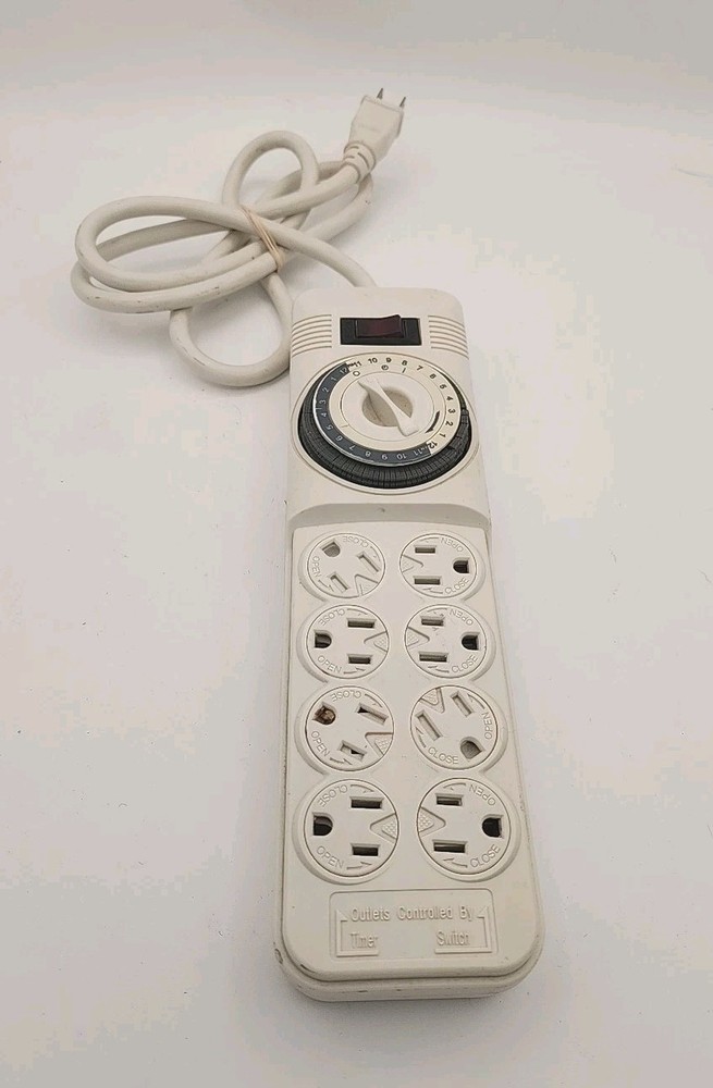 8 OUTLET PROTECTOR: SURGE TIMER + Reset Pre-owned