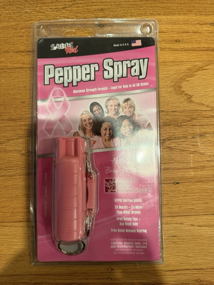 NEW IN PACKAGING SABRE RED PEPPER SPRAY MAXIMUM STRENGTH PINK