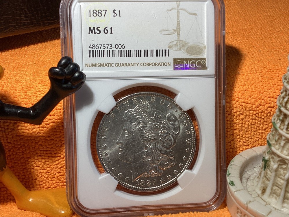 1887 MORGAN SILVER 💰 NGC MS61