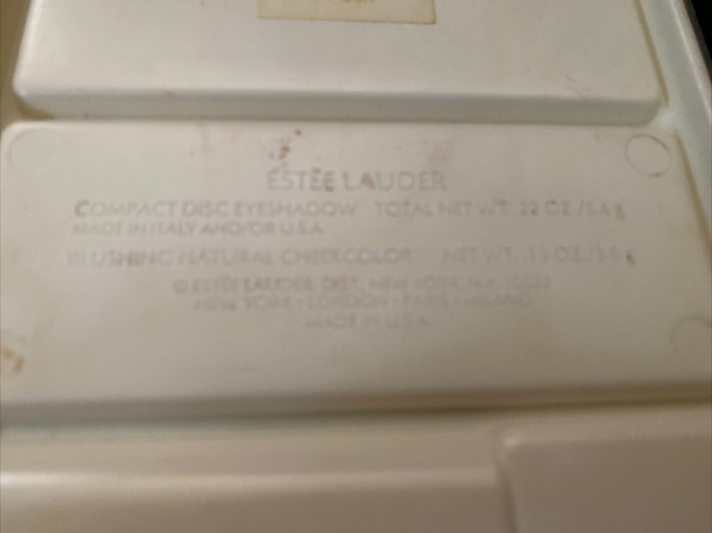 Estee Lauder Compact Disc eyeshadow palette orange violet Blue Pink