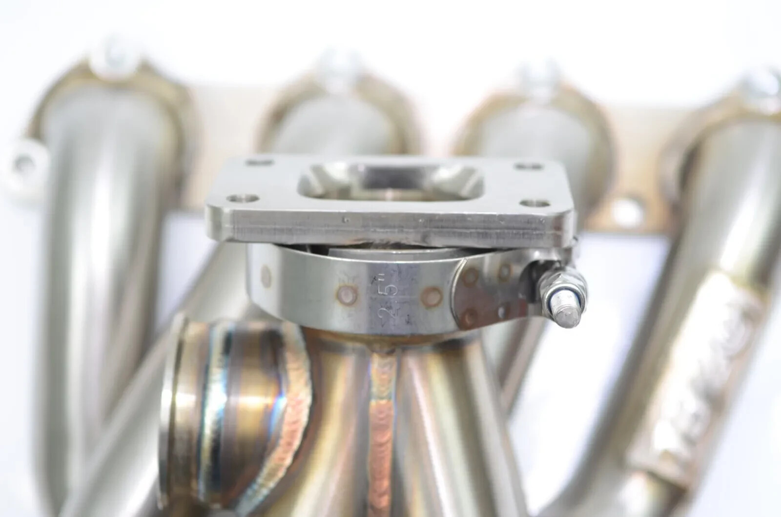 All Out Fab Precision turbo v-band to T3 adapter with hardware and clamp