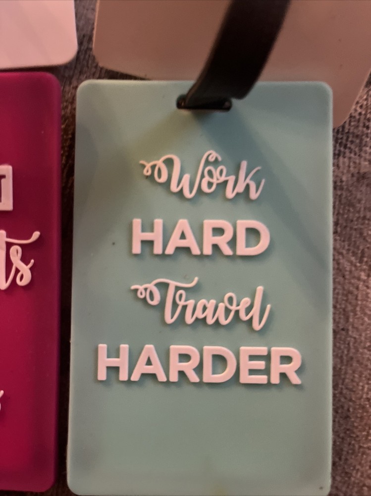 Two Protege Luggage Tags