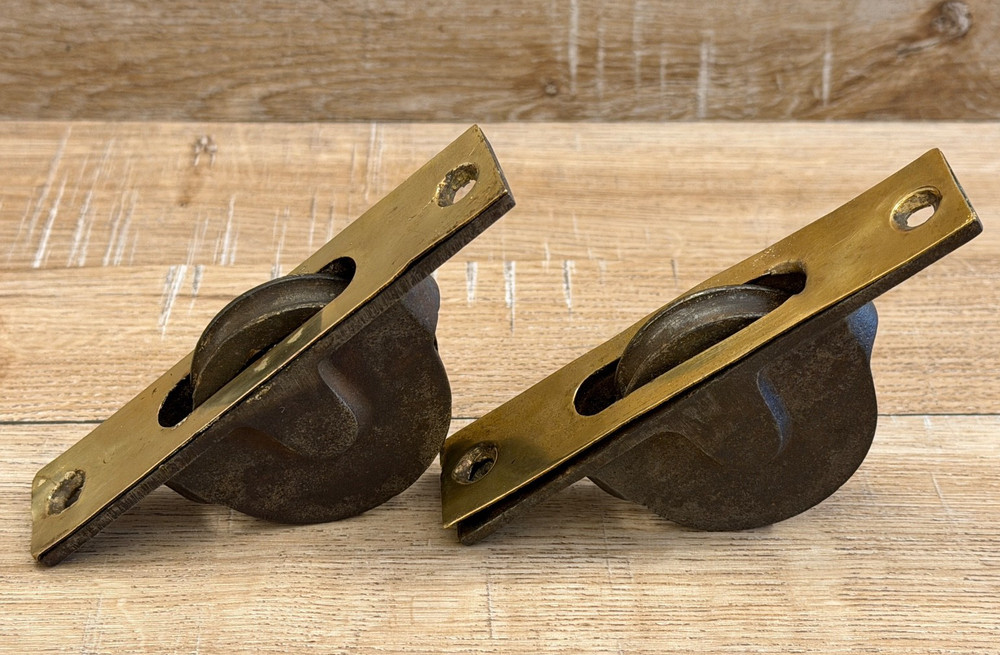 Two Antique Cast Iron, Brass Window Pulleys