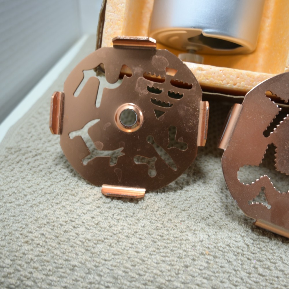 Mirro Dial a cookie cookie press copper colored top and inserts