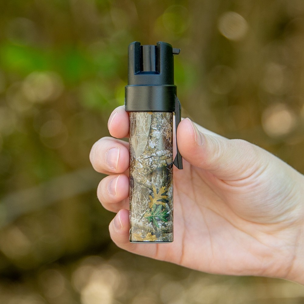 SABRE PEPPER SPRAY WITH ATTACHMENT CLIP CAMO
