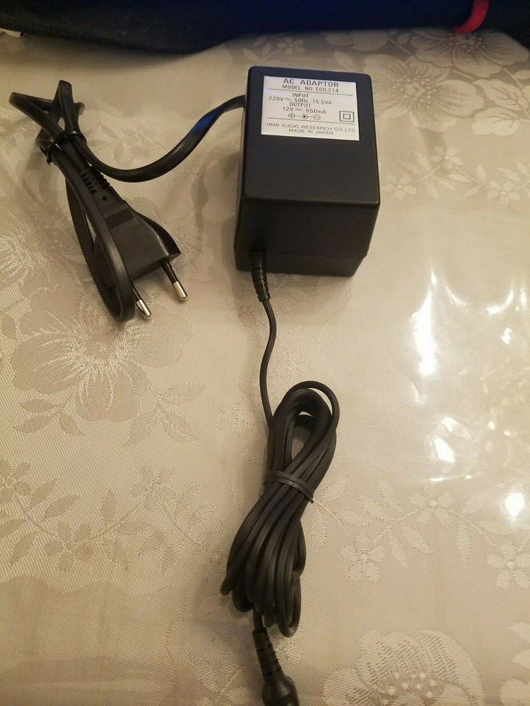 AC ADAPTOR MODEL NO. EOIL 214