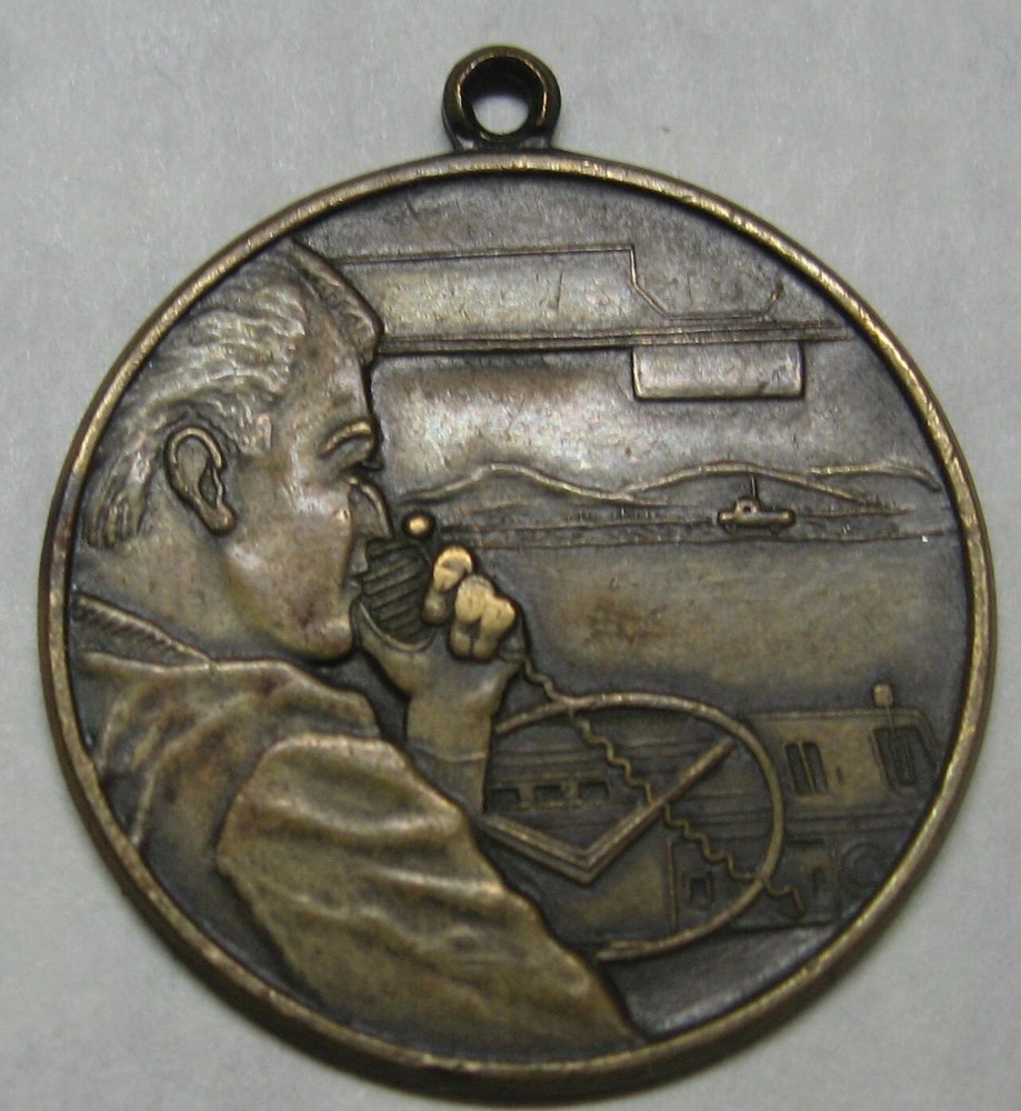 Man Talking on The CB Medal Take a Look