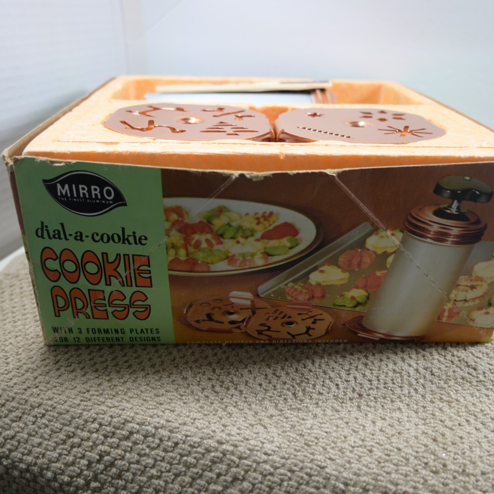 Mirro Dial a cookie cookie press copper colored top and inserts