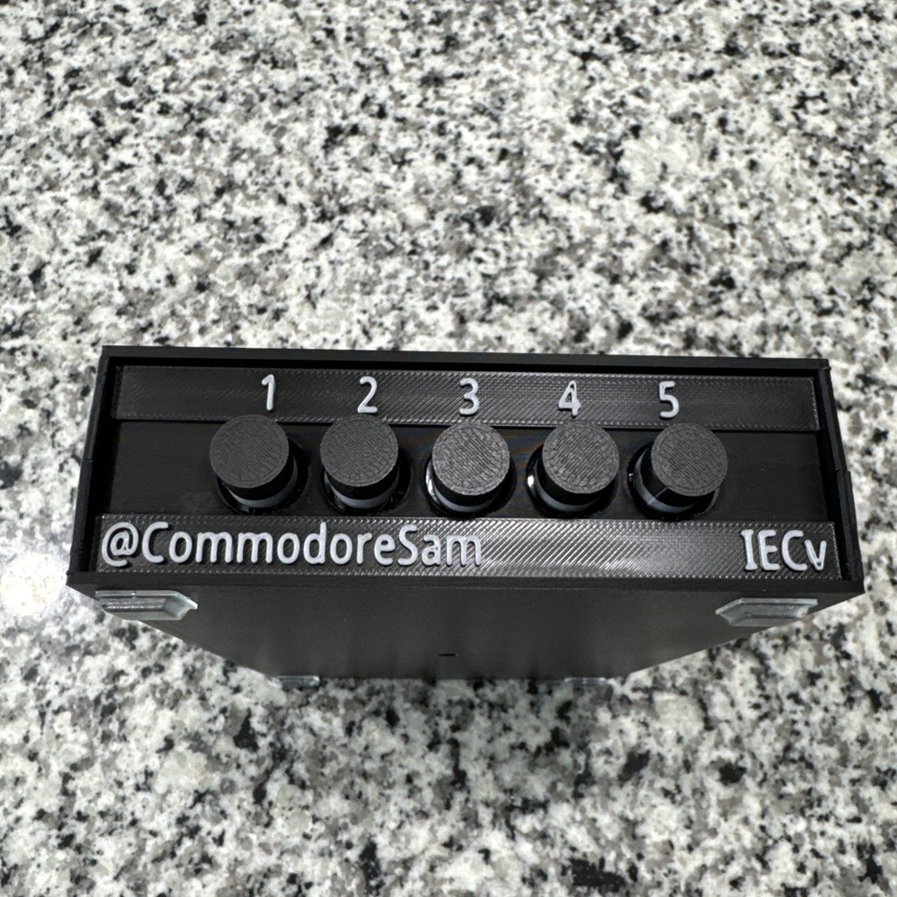 IEC Switch - share disk drives between Commodore 64/128/Vic20/Mega65/X16/OtterX