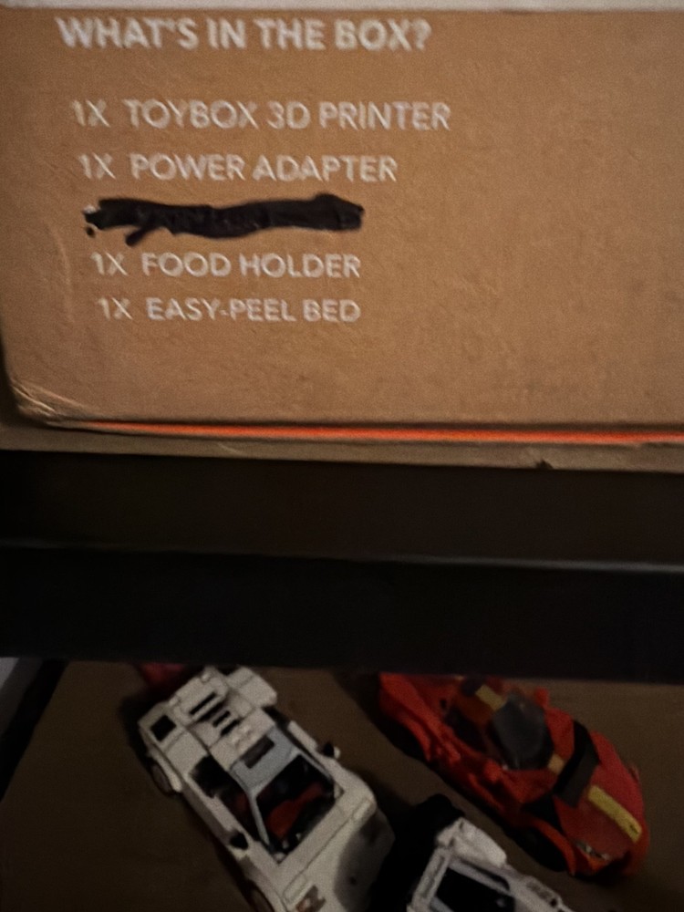 toybox 3d printer alpha 2 with power cable and accessories.