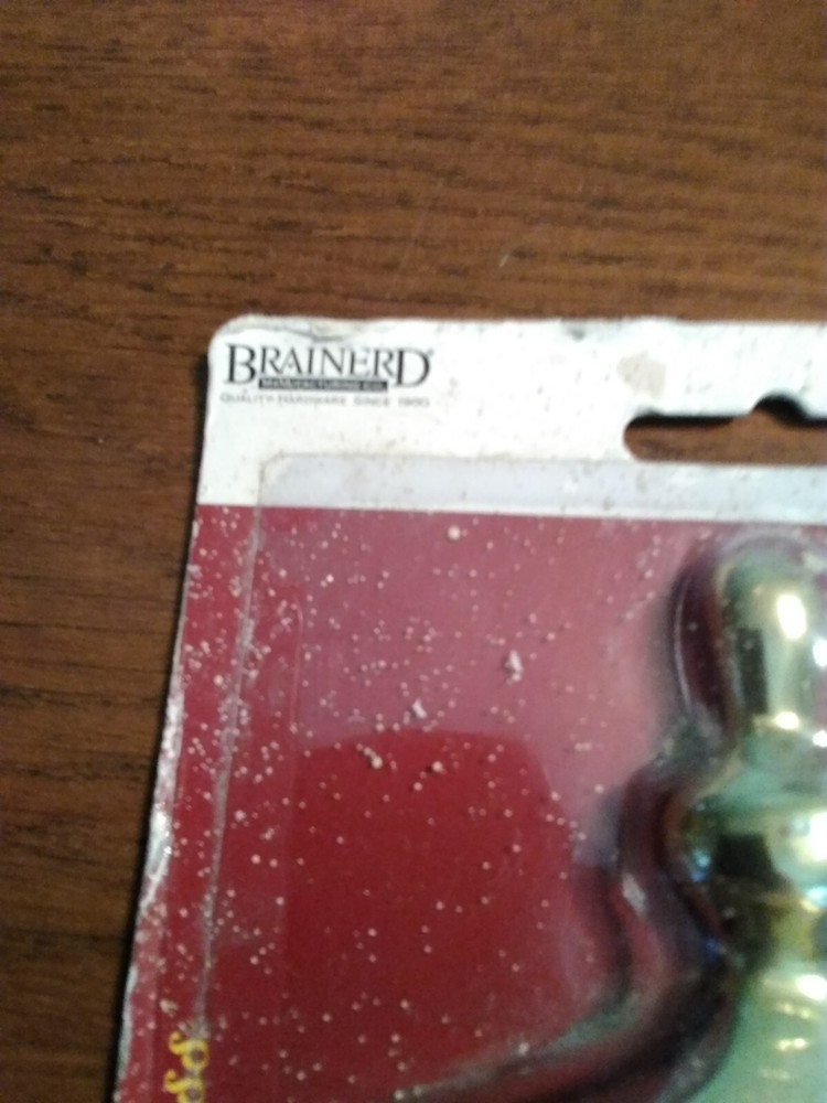Brass Door Knocker. Unopened, but packaging rough. Solid.